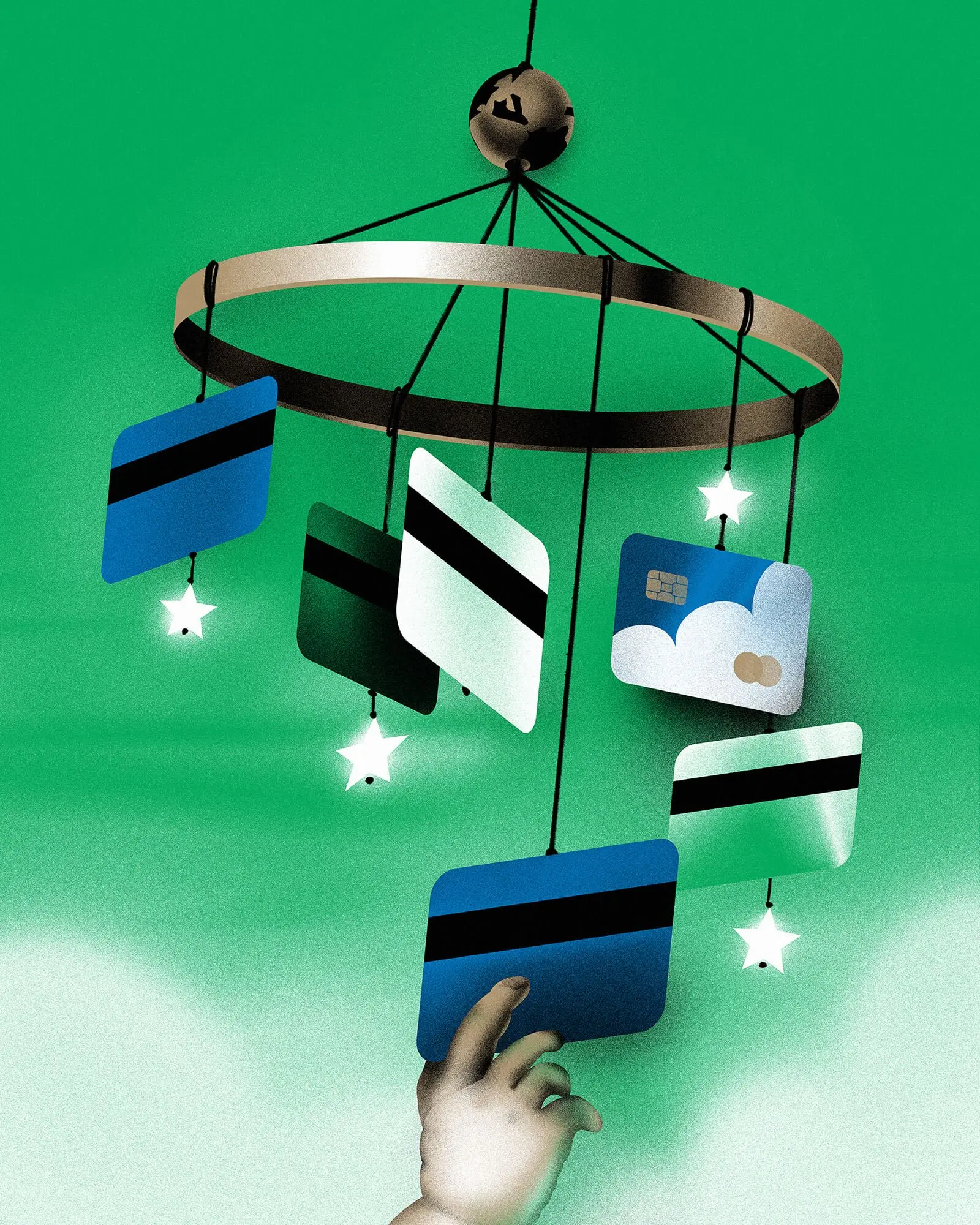 Childs hand reaches for money themed mobile